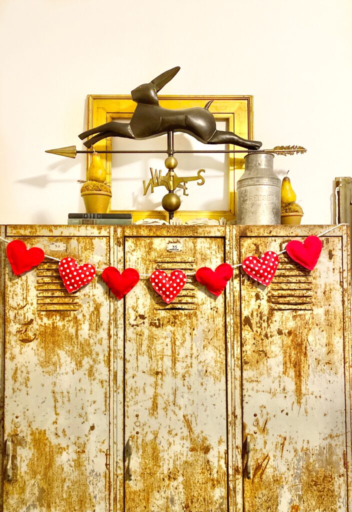 Fabric heart garland hanging on vintage lockers