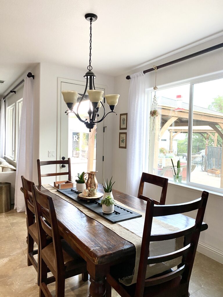 Machine washable curtain panels in a dining room.