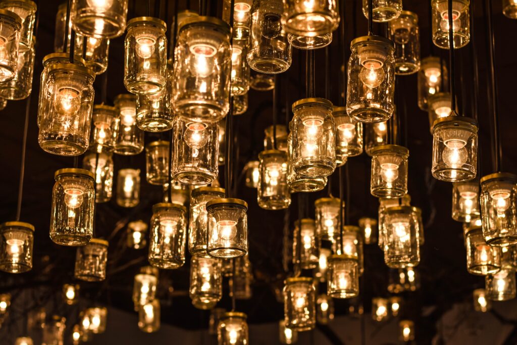 mason jar lanterns hanging in a group