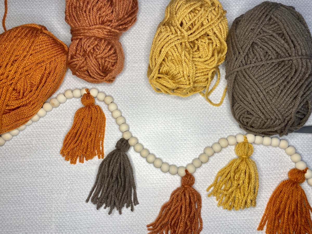 DIY Tassel Garland With Yarn & Wooden Beads