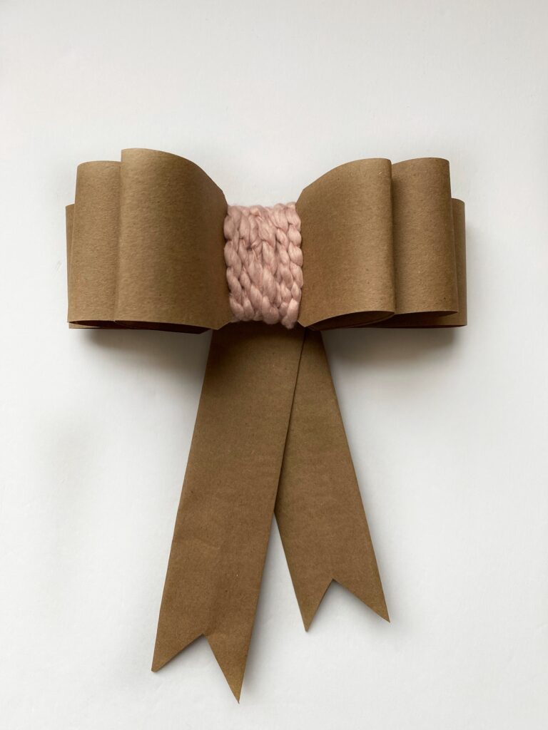 paper bow made with wrapping paper